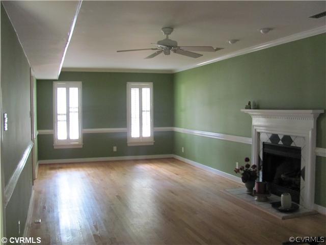 5413 Standing Oak Road Midlothian, VA 23112 - Photo 10 of 12 a view of livingroom and window with wooden floor