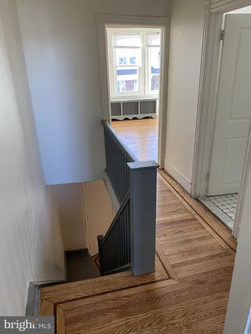 a view of a kitchen from the hallway