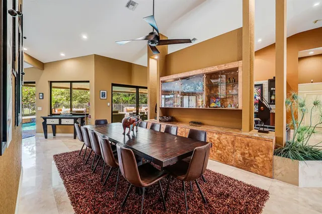a living room with furniture or couch and a large window