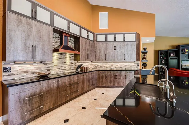 a room with furniture and flat screen tv