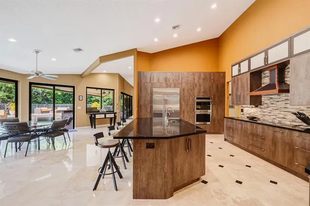 a bedroom with a bed a rug and a desk