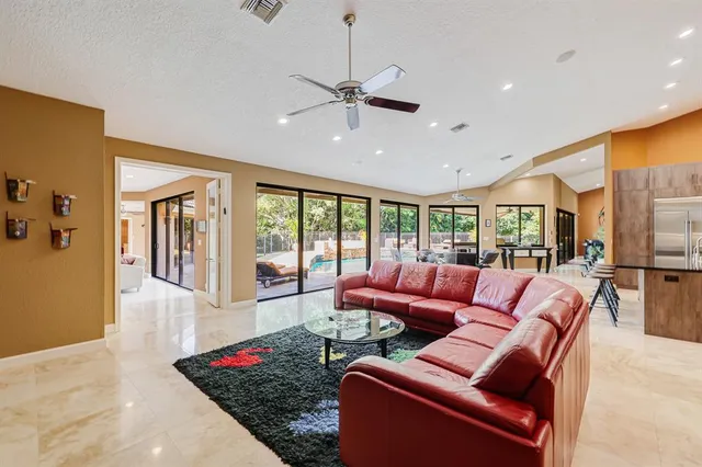 a bathroom with a sink a toilet and a shower