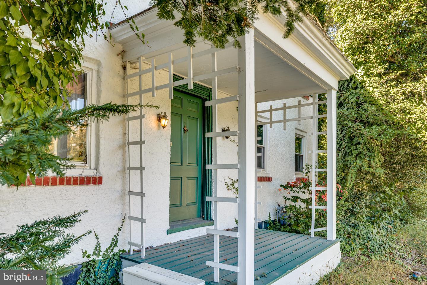 660 South Church Street Mount Laurel, NJ 08054 - Photo 1 of 55 a front view of a house with a tree