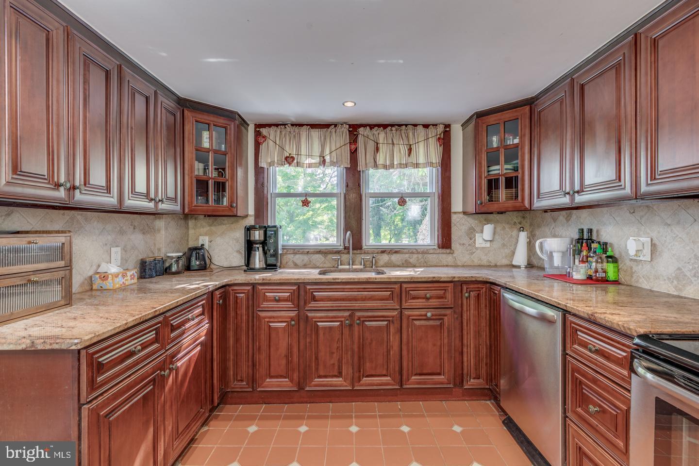 660 South Church Street Mount Laurel, NJ 08054 - Photo 11 of 55 a kitchen with a sink stove top oven and cabinets