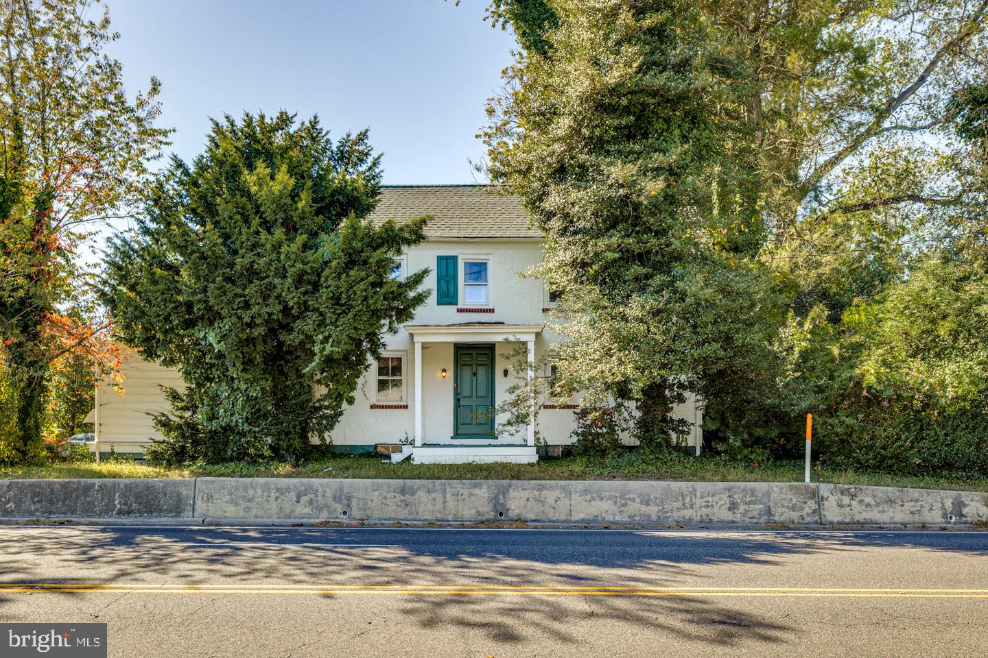 660 South Church Street Mount Laurel, NJ 08054 - Photo 2 of 55 a front view of a house with a garden