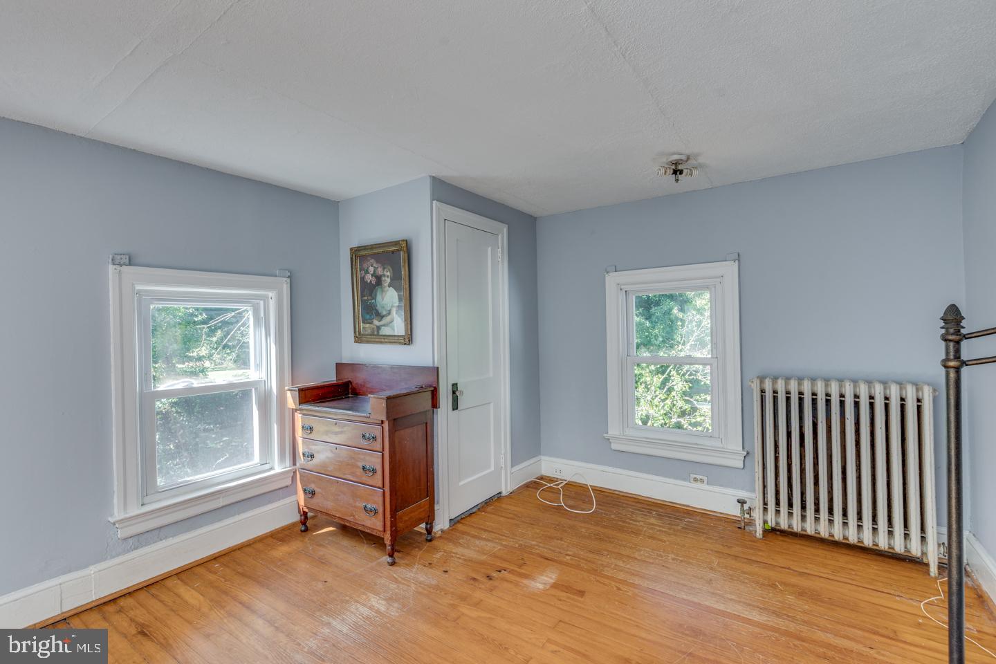 660 South Church Street Mount Laurel, NJ 08054 - Photo 25 of 55 a view of an empty room with a window and wooden floor