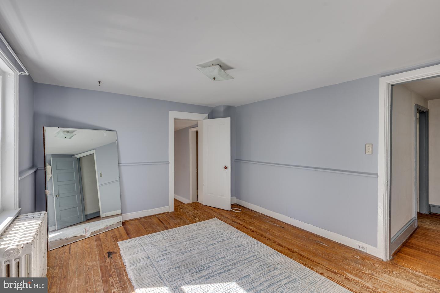 660 South Church Street Mount Laurel, NJ 08054 - Photo 28 of 55 a view of a room with wooden floor and a ceiling fan