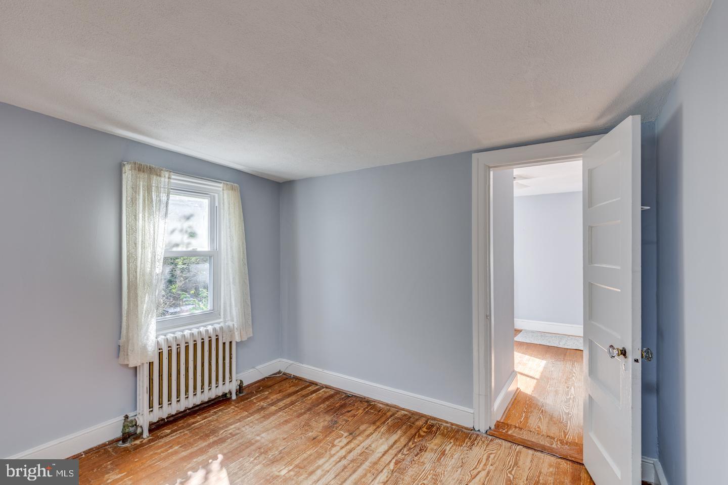 660 South Church Street Mount Laurel, NJ 08054 - Photo 33 of 55 a view of an empty room with wooden floor and a window