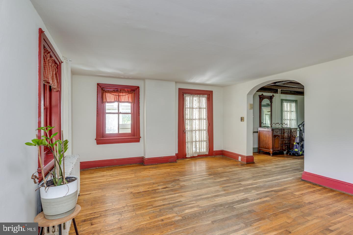 660 South Church Street Mount Laurel, NJ 08054 - Photo 6 of 55 a view of an empty room with window and wooden floor