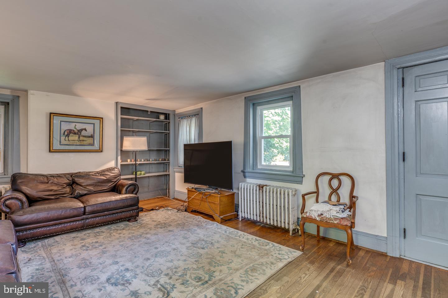 660 South Church Street Mount Laurel, NJ 08054 - Photo 7 of 55 a living room with furniture and a flat screen tv