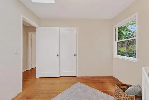 a view of an empty room and window
