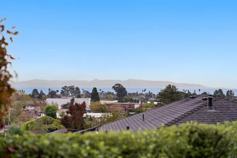 an aerial view of a city with lots of residential buildings