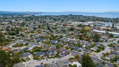 an aerial view of a city with lots of residential buildings