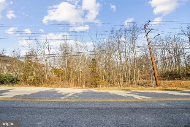 a view of street with a building in the background