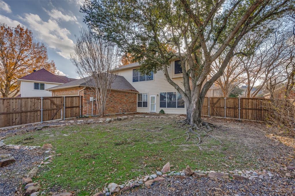 2248 Amy Lane Plano, TX 75074 - Photo 8 of 26 view of back of house from backyard