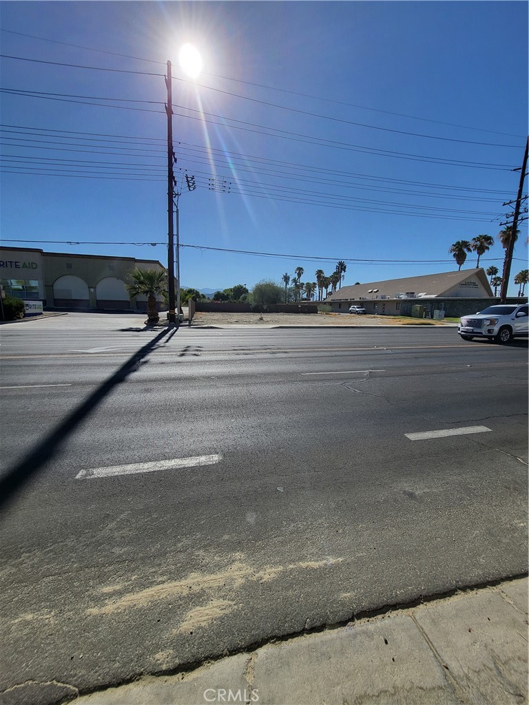 47797 Monroe Street Indio, CA 92201 - Photo 2 of 12 a view of a parking space