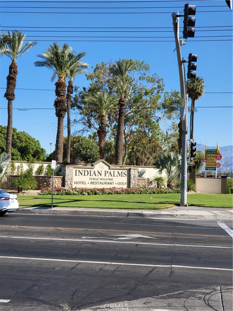 47797 Monroe Street Indio, CA 92201 - Photo 7 of 12 a view of a parked cars in front of a building
