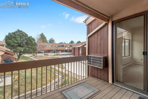 a view of a gate with a street