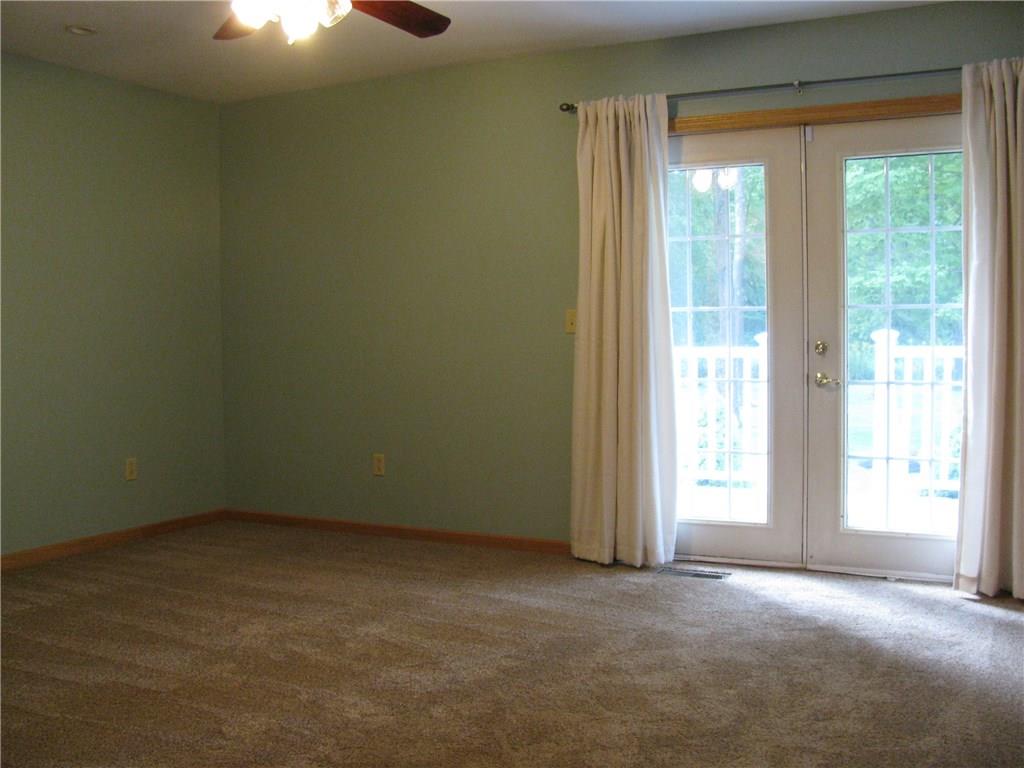 161 Donation Road Greenville, PA 16125 - Photo 17 of 25 MASTER BEDROOM EN SUITE WITH PRIVATE DECK TO REAR YARD