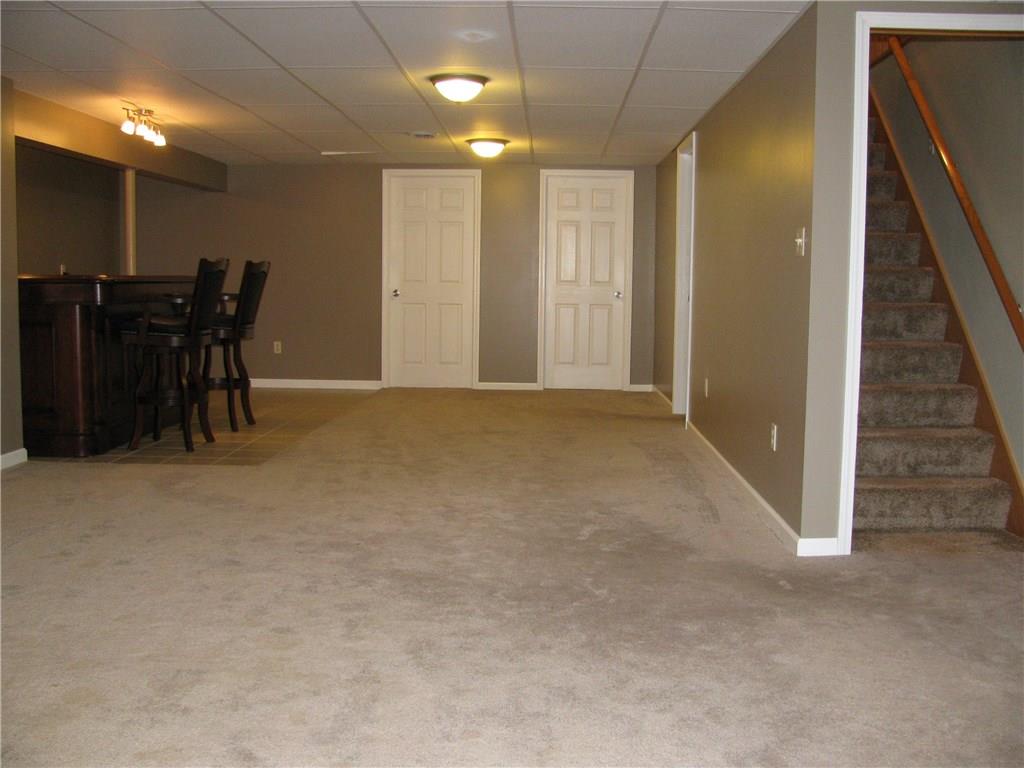 161 Donation Road Greenville, PA 16125 - Photo 23 of 25 LOWER LEVEL GAME ROOM. DOORS LEAD TO BEDROOMS AND A FULL BATH WITH STANDING SHOWER