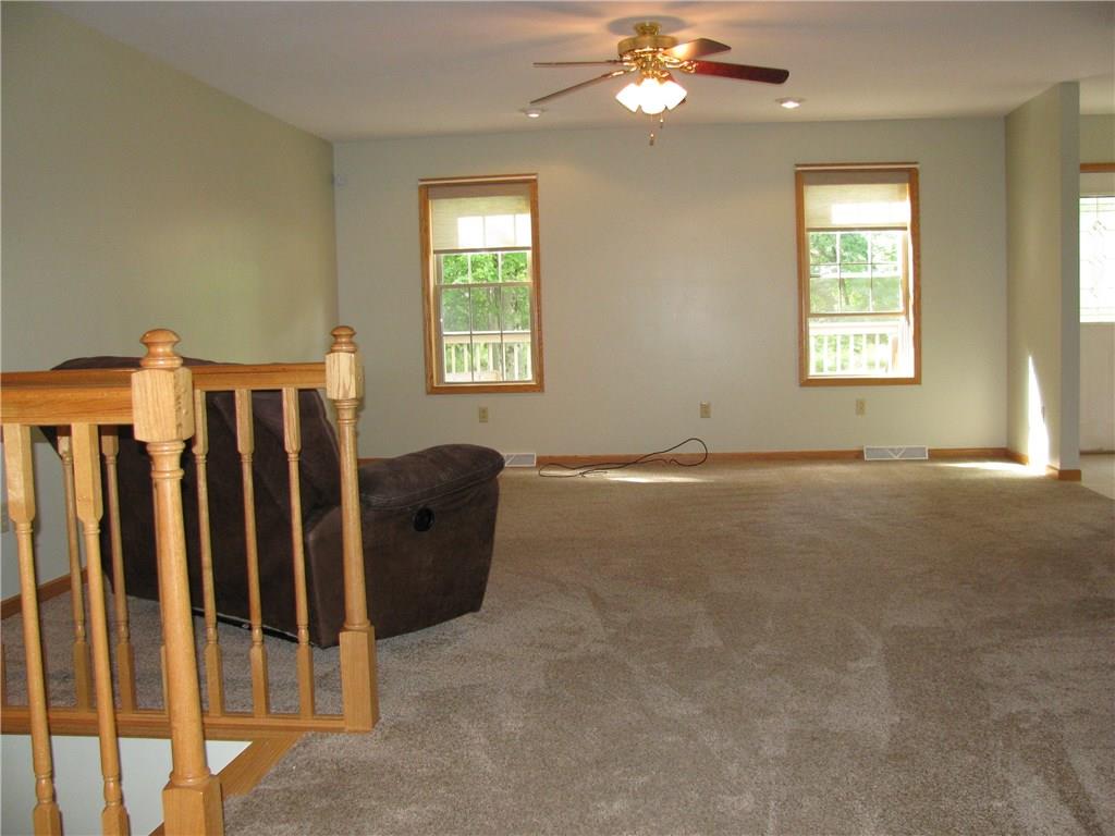 161 Donation Road Greenville, PA 16125 - Photo 6 of 25 FAMILY ROOM AS YOU ENTER THE HOUSE/STAIRS DESCEND TO THE FINISHED LOWER LEVEL