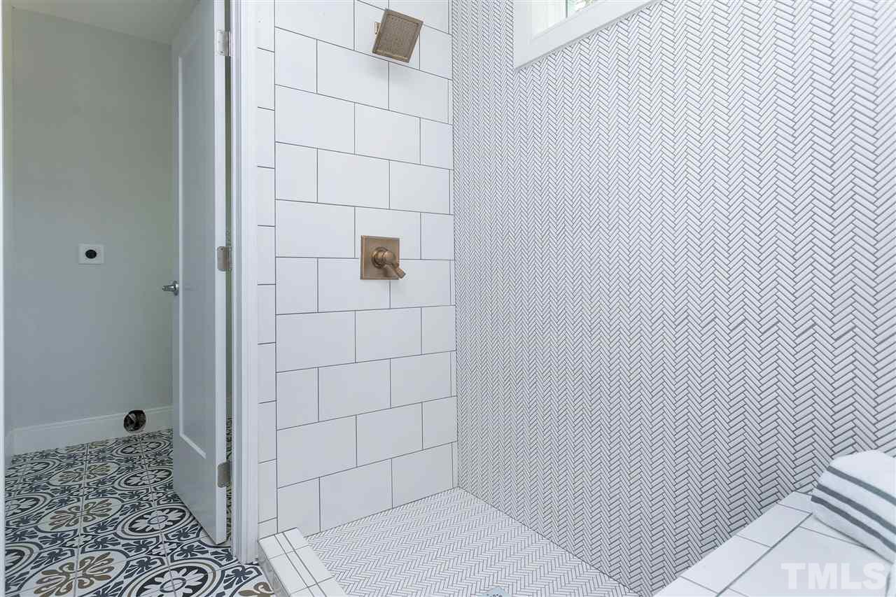 111 Bart Street Raleigh, NC 27610 - Photo 17 of 22 a bathroom with a shower