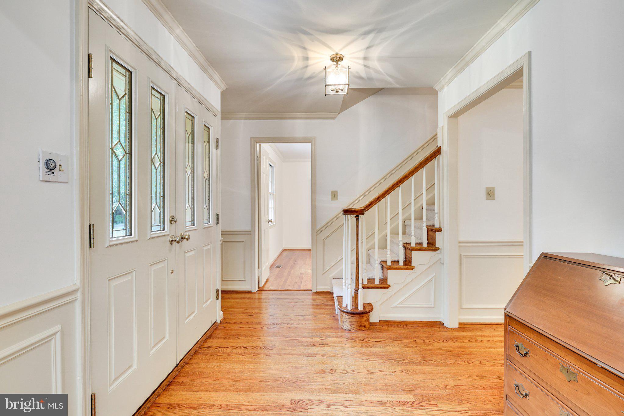 1427 Laurel Hill Road Vienna, VA 22182 - Photo 5 of 57 Inviting entryway with elegant charm.