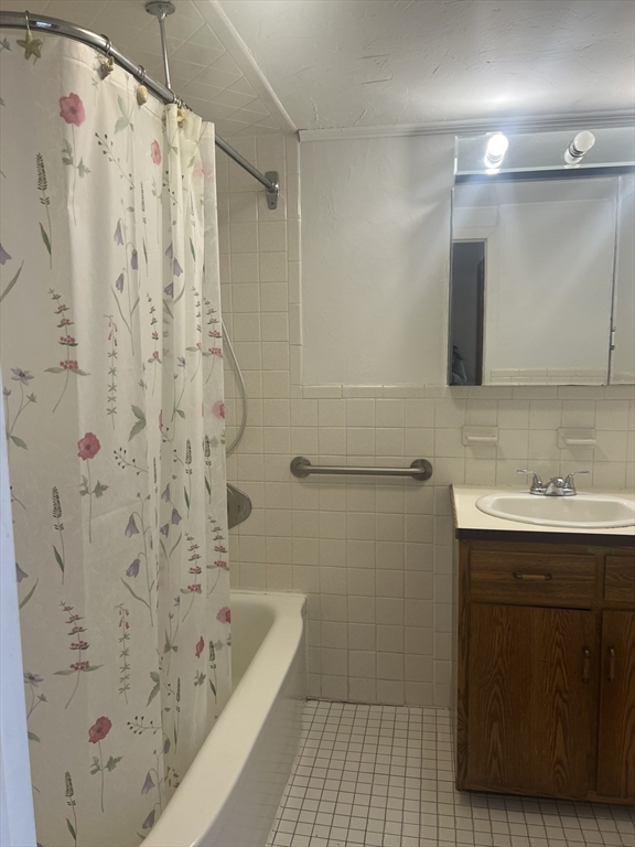 6 A Maple Avenue, Unit 6A Scituate, MA 02066 - Photo 19 of 21 a bathroom with a sink a toilet and shower