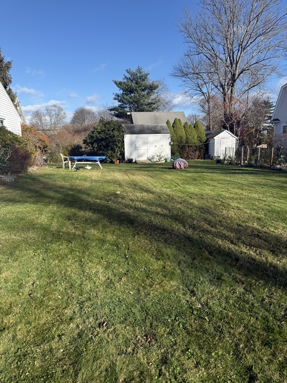 6 A Maple Avenue, Unit 6A Scituate, MA 02066 - Photo 21 of 21 a front view of a house with a yard