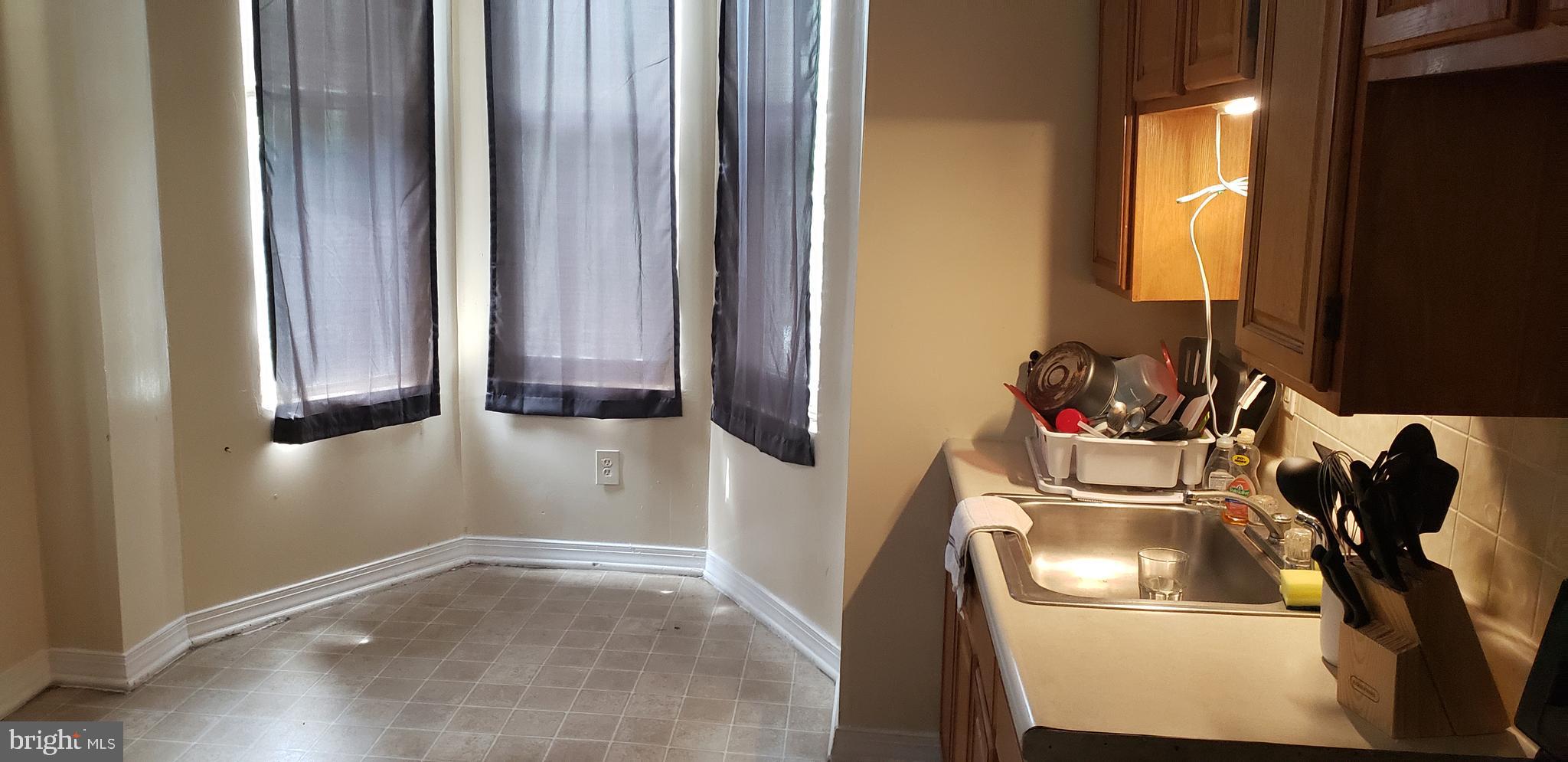 1532 Mineral Spring Road Reading, PA 19602 - Photo 6 of 8 a bathroom with a sink and a mirror