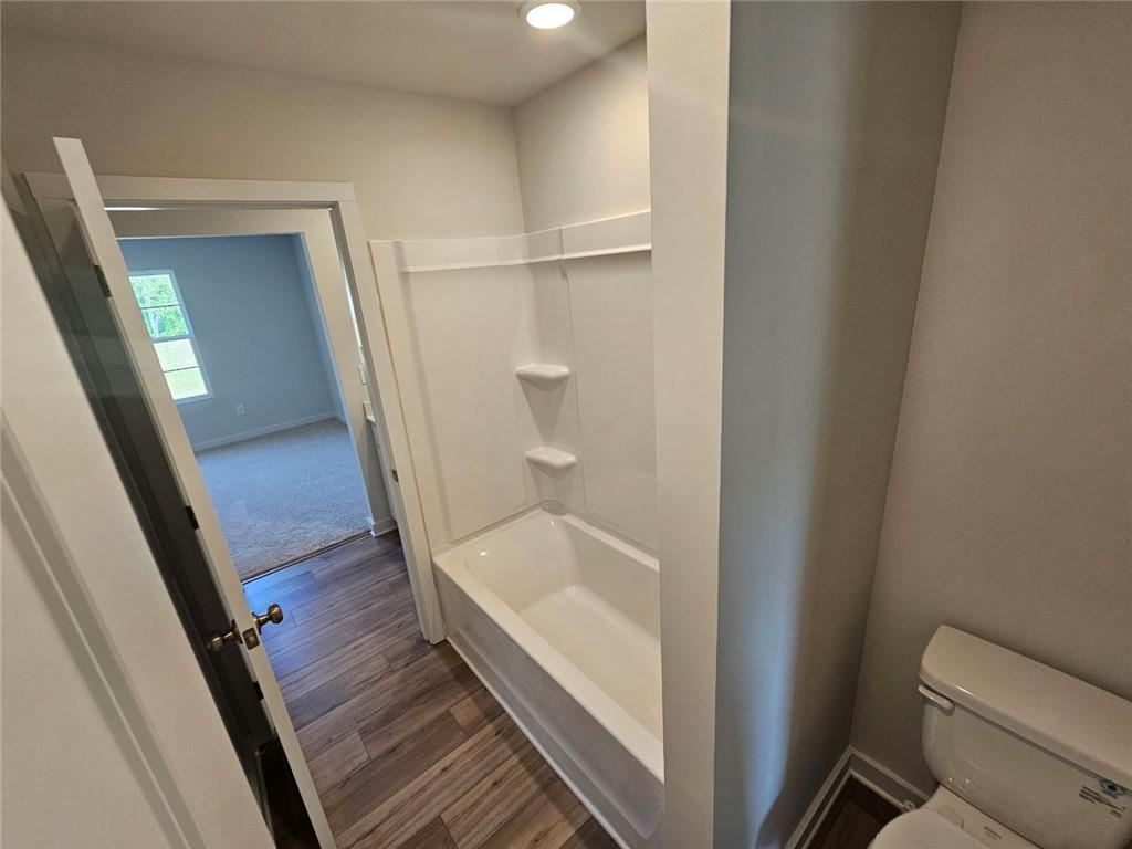 2690 Harbor Rdg Pass Gainesville, GA 30507 - Photo 15 of 19 a bathroom with a tub and shower