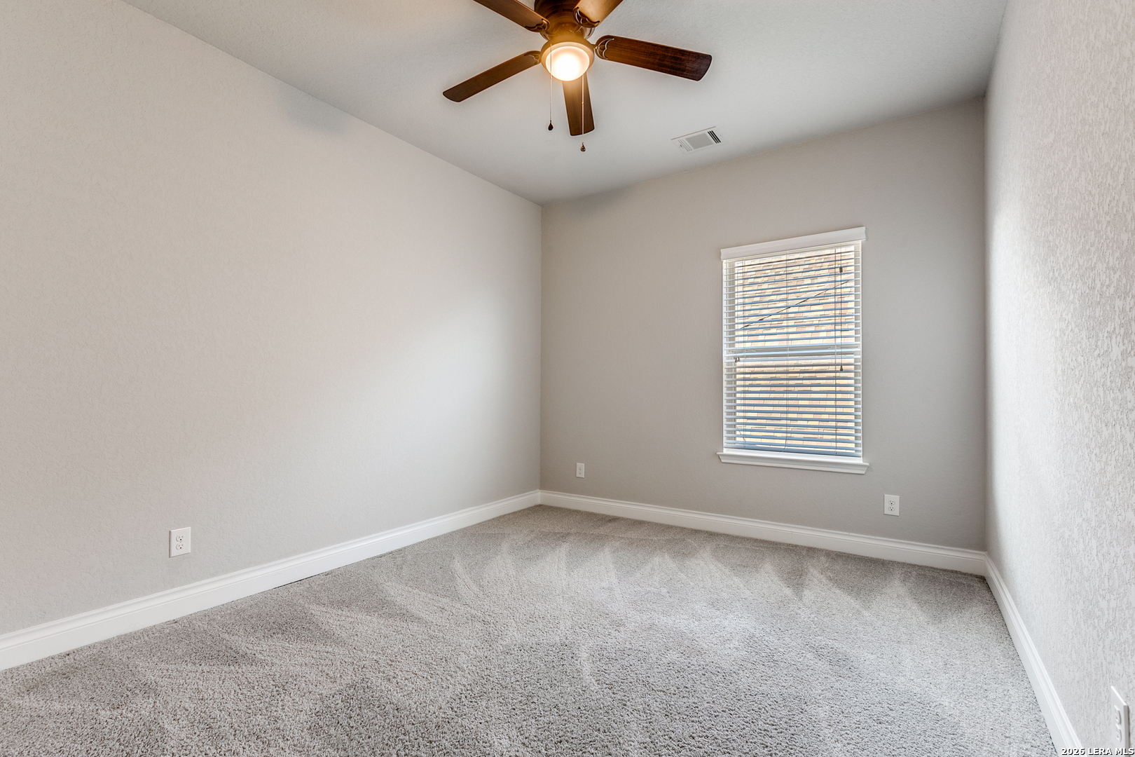 331 Ricadonna San Antonio, TX 78253 - Photo 19 of 28 a view of an empty room with a window