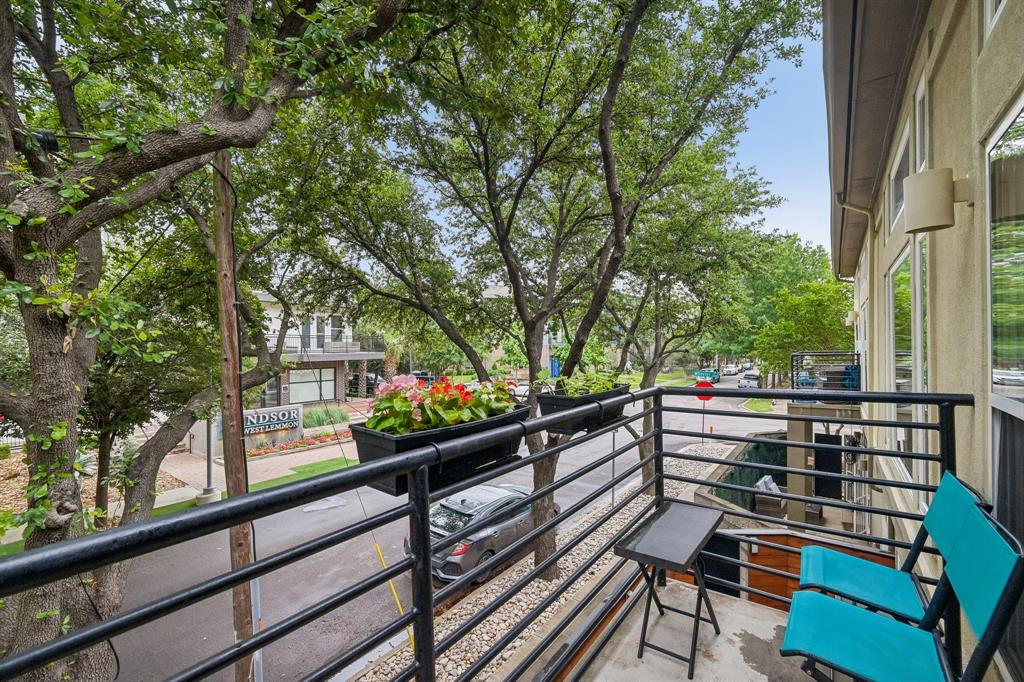 3553 Wheeler Street Dallas, TX 75209 - Photo 18 of 35 Private treetop balcony off living area with metal railing, mature oak canopy, and neighborhood views near Medical District