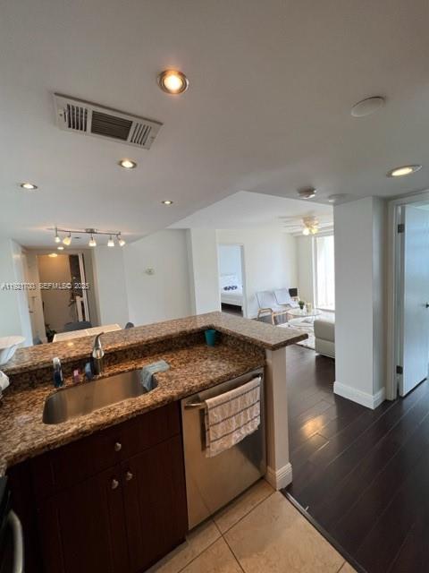 770 Claughton Island Drive, Unit 1404 Miami, FL 33131 - Photo 13 of 23 a kitchen with a sink and stove