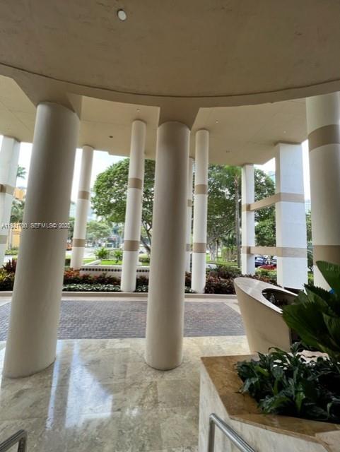 770 Claughton Island Drive, Unit 1404 Miami, FL 33131 - Photo 19 of 23 a view of a living room and floor to ceiling window or couch