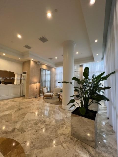 770 Claughton Island Drive, Unit 1404 Miami, FL 33131 - Photo 21 of 23 a view of a room with kitchen view and living room