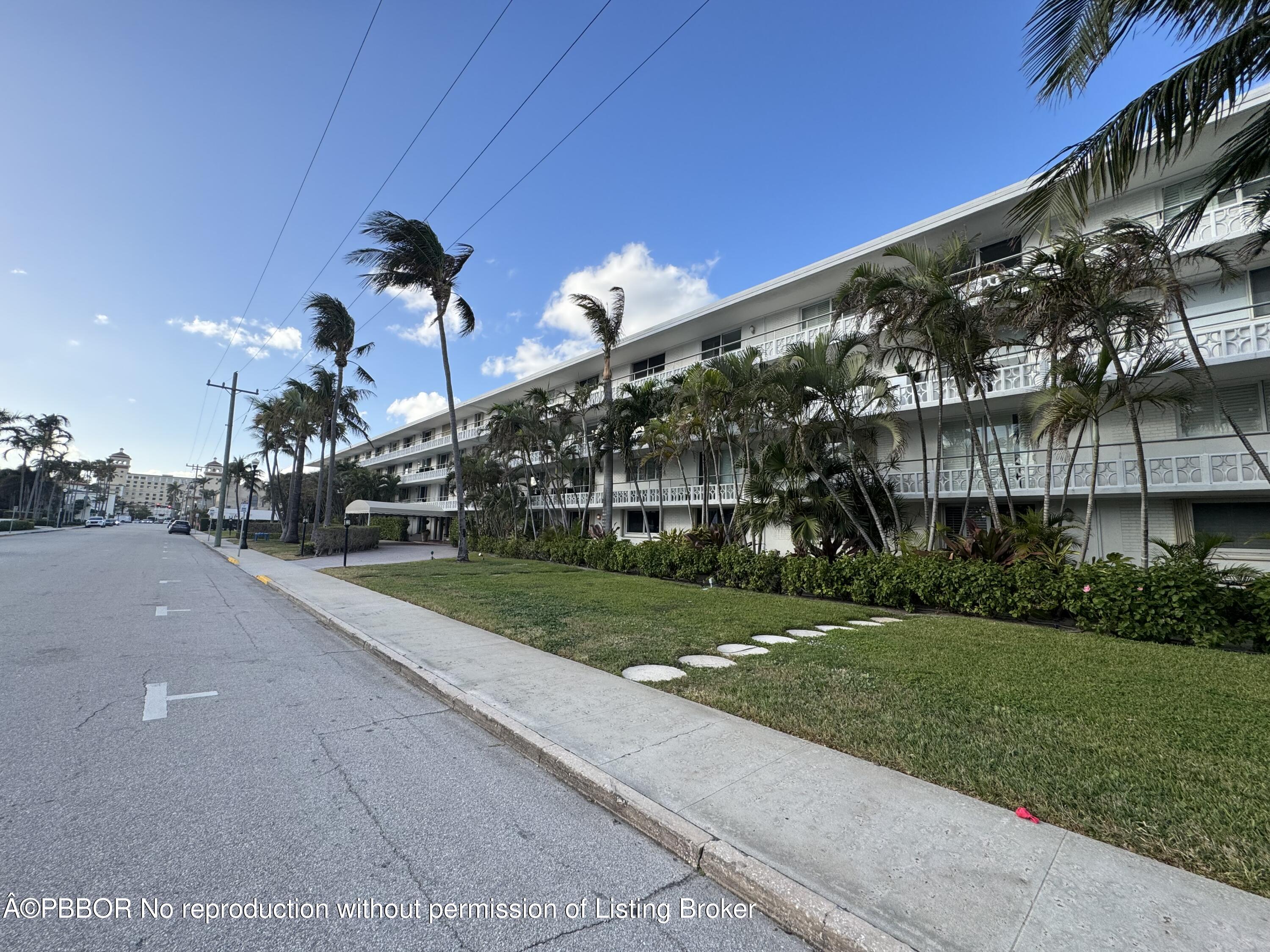 a view of a building and a yard