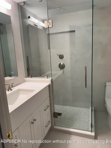 a kitchen with a sink stove and microwave