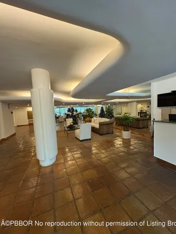 a front view of a house with beach