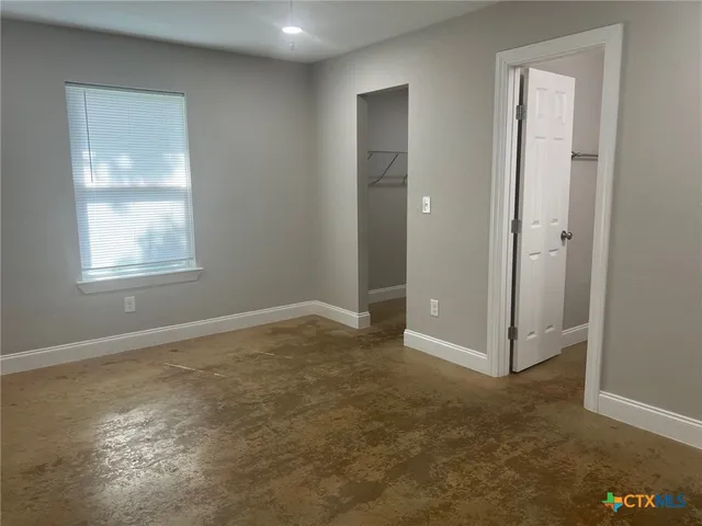 an empty room with a window