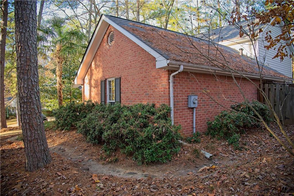 425 Hackberry Lane Roswell, GA 30076 - Photo 23 of 28 a view of a house with a yard