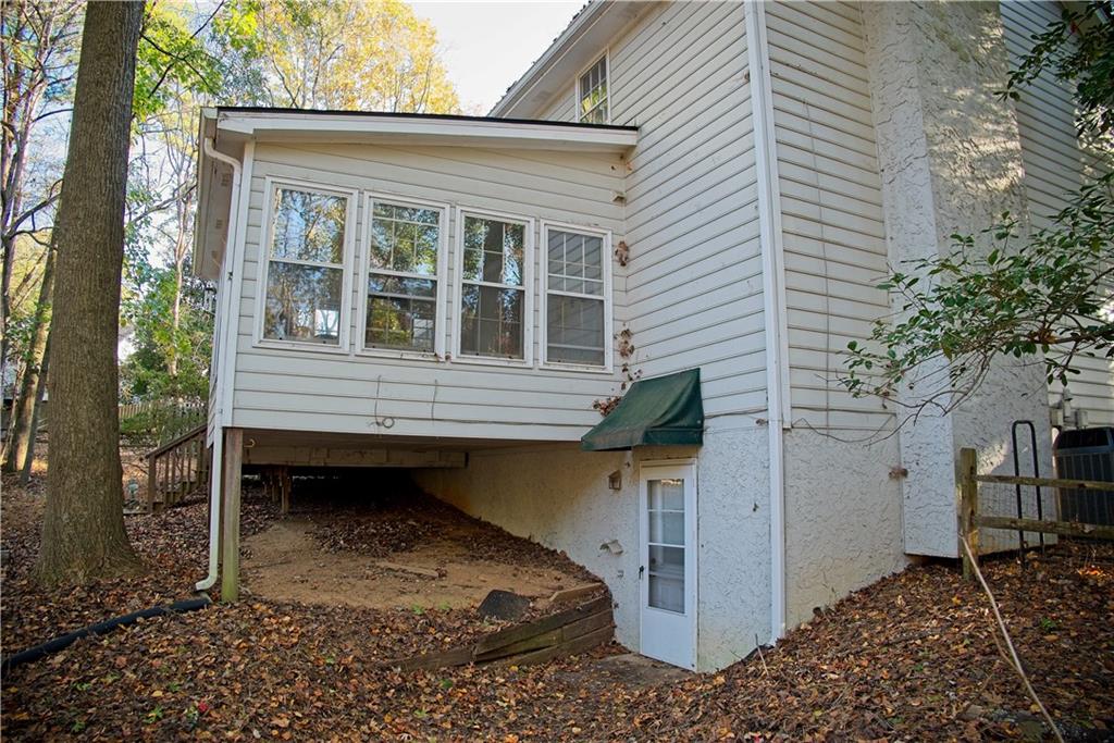 425 Hackberry Lane Roswell, GA 30076 - Photo 9 of 28 a front view of a house with balcony