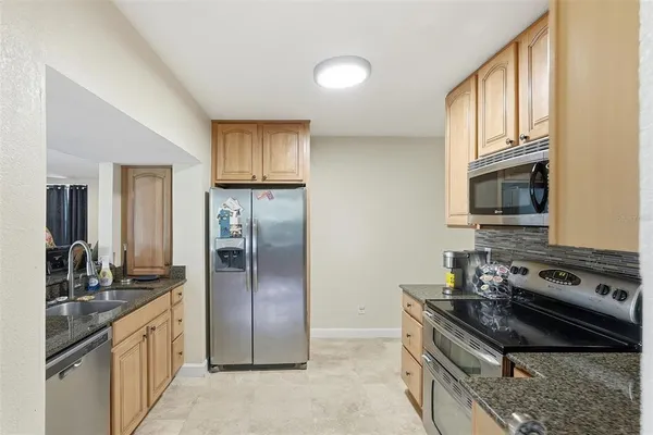 a bathroom with a shower and a toilet