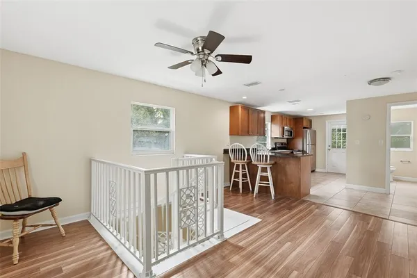 a view of balcony with wooden floor