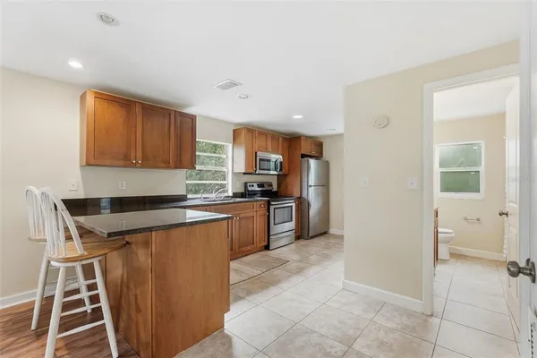 a view of a balcony with wooden floor
