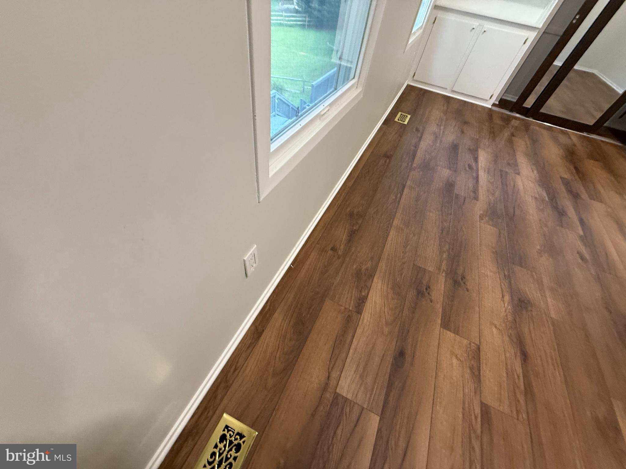 14917 Lear Lane Silver Spring, MD 20905 - Photo 21 of 49 a view of balcony with wooden floor