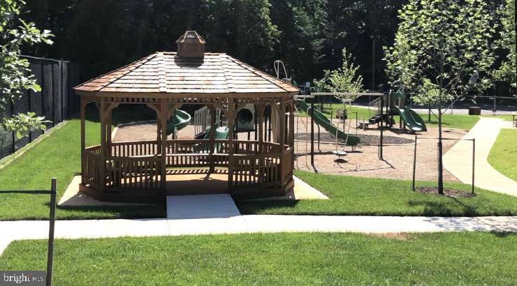 14917 Lear Lane Silver Spring, MD 20905 - Photo 47 of 49 a view of a table and chairs in the yard