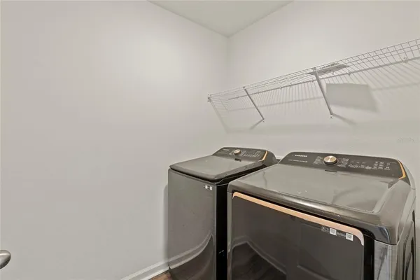 an aerial view of a house with a ocean view