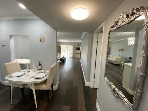 a view of a park with large trees