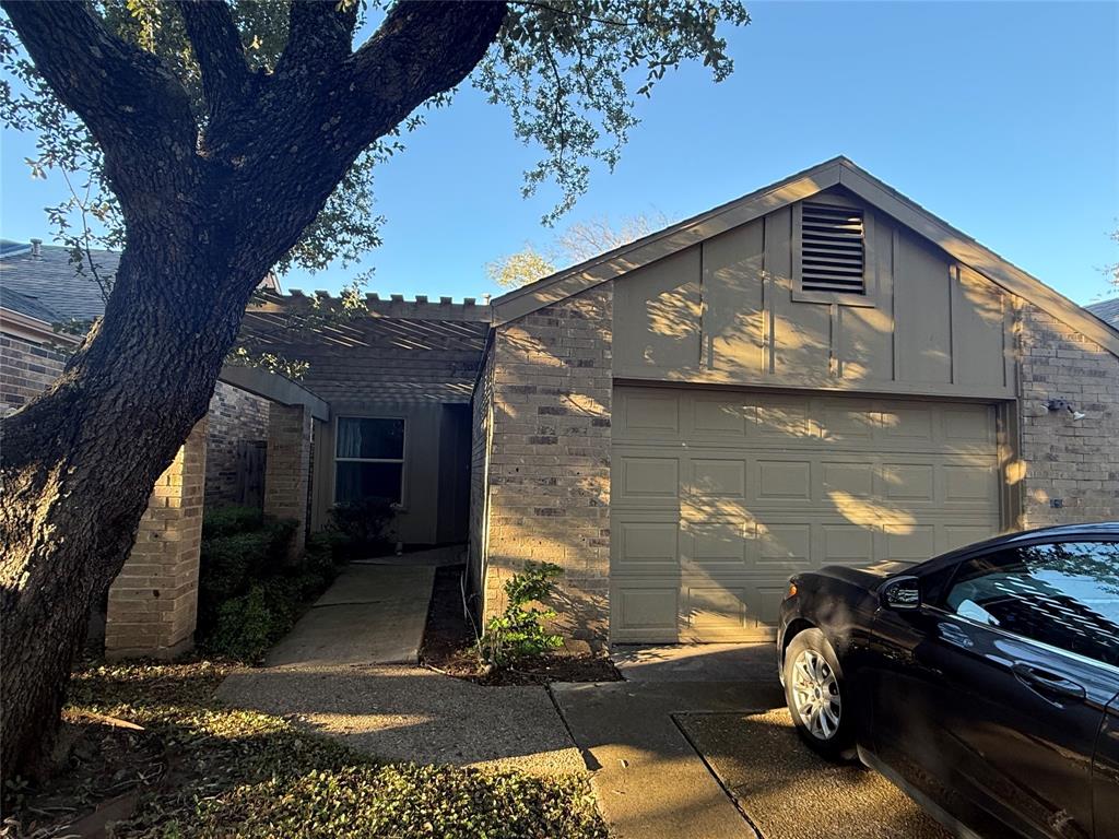 4139 Rosser Square Dallas, TX 75244 - Photo 1 of 7 a front view of a house with a yard